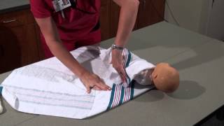 Parenting and Infant Care  How to Swaddle a Baby  Womans Hospital  Baton Rouge La [upl. by Anikram246]