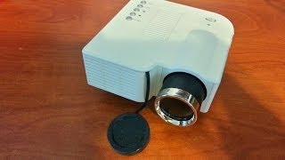 UC28 LED Mini Projector UNIC disassembly teardown [upl. by Naltiac]