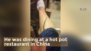 Rat climbs up mans pants during hot pot dinner [upl. by Noremmac54]