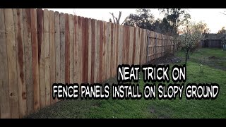 Putting up Premade Wood Fence Panels on slopy ground  simple tricks you need to know [upl. by Nahsab931]