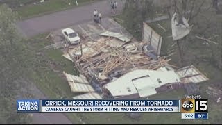 Storm chaser video shows rescue of woman and dog [upl. by Ahserb]