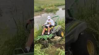 JOHN DEERE ZERO TURN MOWER SLIDING INTO A CREEK lawncare johndeere viralvideo mowing [upl. by Artima]