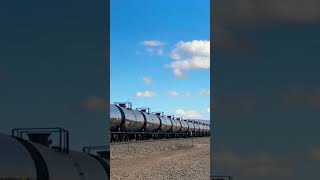 Large Black Tanker Railcars passing Railway Crossing [upl. by Eirok]