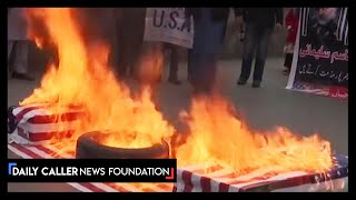 Iranian Protester Burn US Flag Following Death Of Military Leader [upl. by Idyak]