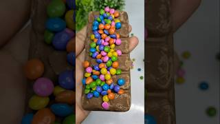 Dairy milk silk with mini gems chocolate 🍫🍫youtubeshorts viralvideo shortvideo [upl. by Aivila]