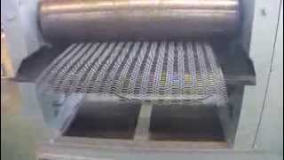 Expanded metal mesh flattening machine [upl. by Ariday]