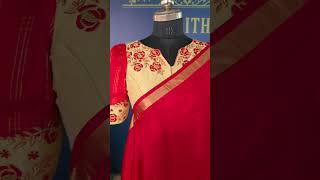 A red plain saree paired with a creamcolored blouse [upl. by Ayatal611]