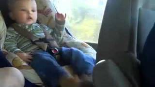 Baby dancing in car seat [upl. by Irrabaj]