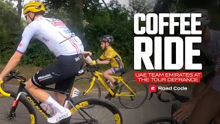 Tadej Pogacar gives bottle to young fan on UAE Team Emirates Tour de France coffee ride [upl. by Hemphill]