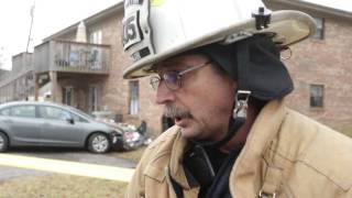 Firefighters pull a car out of an apartment [upl. by Eelyk]