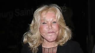 Jocelyn Wildenstein 82 looks youthful in a plunging mesh top as she shares a kiss with her fiancé [upl. by Zetnauq]