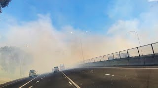 South Africa  Smoke from veld fires along the R300 near the Cape Town International Airport [upl. by Kacie]