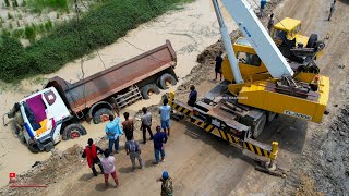 incredible dump truck slippery​ on road in water use helping technical by truck crane 80TON [upl. by Dduj]