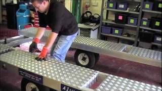 lightweight tilt bed car trailer stores on floor in garage [upl. by Trask]