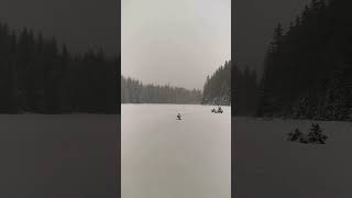 Snowshoeing in the French Alps beside a frozen lake hikingadventures snow snowshoe alps france [upl. by Aneekan]