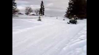 1991 Arctic Cat Wildcat 700cc Snowmobile jump in slow mo [upl. by Stephani]