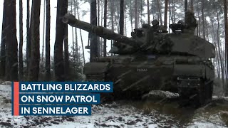 UK Challenger 2s plough through blizzards during testing training [upl. by Zetnod]