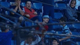 A young fan misses ball Yankees help out [upl. by Dennie394]