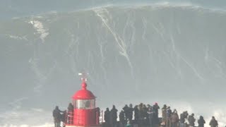 Big wave surfers ride 20 metre waves in Nazare [upl. by Sirap]