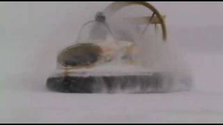 Universal Hovercraft UH14P modified racing around on snow covered Lake Geneva during a blizzard [upl. by Elleynad]