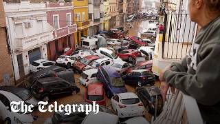 Spain flash floods Dozens dead as cars pile up in Valencia [upl. by Frederiksen]