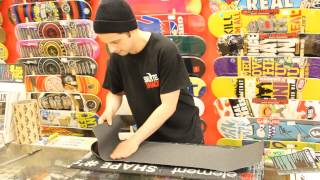 How to apply griptape to a skateboard deck [upl. by Anaes]