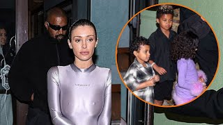 Bianca Censori COVERS UP in a figurehugging shiny jumpsuit for Night out with Kanye West and kids [upl. by Oulman885]