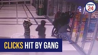 Nine armed robbers force their way into a Clicks store in Johannesburg [upl. by Krever12]