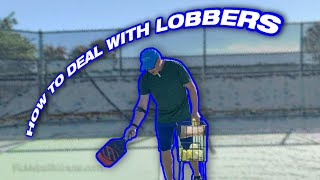 How to deal with LOBBERS  Pickleball Minute [upl. by Elacsap]