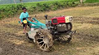 Agricultural land is being cultivated with power tiller machines for paddy production । [upl. by Dawkins]