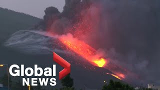 La Palma volcano Lava pours from new vent as lockdowns lifted [upl. by Allevon190]