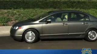 2006 Honda Civic Hybrid Review  Kelley Blue Book [upl. by Ahsinek853]