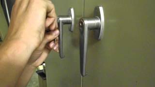 Picking the lock on a file cabinet with a bobby pin [upl. by Eidualc]