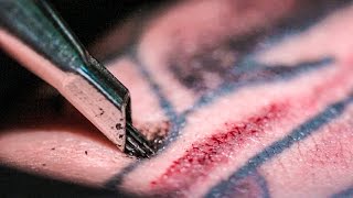 TATTOOING Close Up in Slow Motion  Smarter Every Day 122 [upl. by Leveroni]