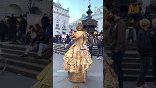 London Famous Golden Statue Lady in Piccadilly Circus  Central London [upl. by Nyhagen]