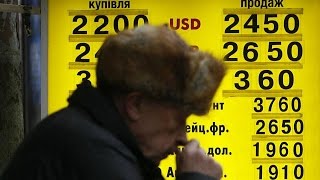 Ucraina crolla il cambio Lincubo dei prestiti in dollari  economy [upl. by Najed]