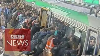 Train rescue Passengers tilt train to free trapped man in Australia  BBC News [upl. by Lihkin]