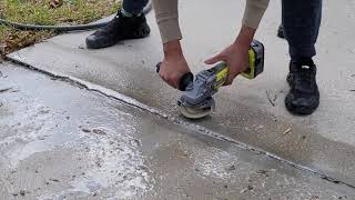 How to repair a trip hazard or an uneven raised concrete sidewalk or slab [upl. by Llemhar]