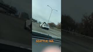 SEATTLE WA TESLA DRIVING WITH DOOR OPEN ON FREEWAY [upl. by Nauj]