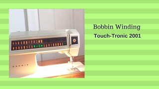 How to wind the bobbin of Singer TouchTronic 2001 Memory Machine [upl. by Carpio397]