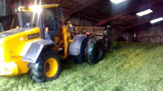 JCB 414s buckraking on silage pit [upl. by Mcferren682]