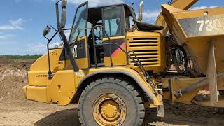 How to drive a dump truck Cat 730 [upl. by Niven]