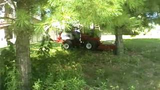 VENTRAC Tractor Mowing Steep Pond Bank [upl. by Gherardo292]