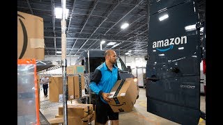 Amazon to raise its minimum wage to 15 on Nov 1 [upl. by Ludewig486]