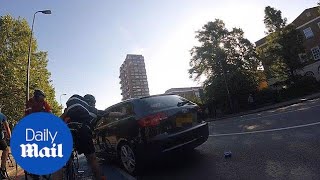 Driver in allegedly stolen car aggressively rams cyclists in London [upl. by Eidoow]