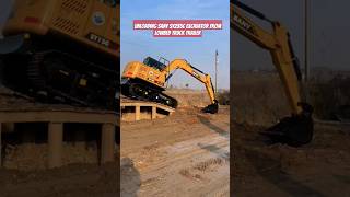 Unloading sany sy235c excavator from lowbed truck trailer shorts [upl. by Firahs854]