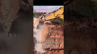 2 excavators dig a big rock short excavators digabigrock [upl. by Erdah186]