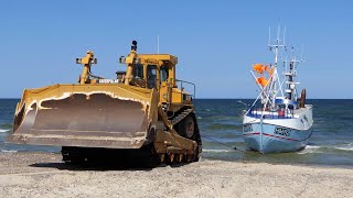 CAT D10N Dozer Pulling Up Fishing Boats to the Beach at Thorup Strand [upl. by Okoy]