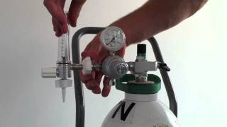 Fitting a Regulator amp Flowmeter to a Gas Cylinder  Demonstration [upl. by Ollopa]