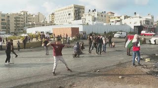 Palestinians throw stones at Israeli forces in West Bank  AFP [upl. by Roer]